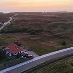 ゲストハウス In De Duinen 3*